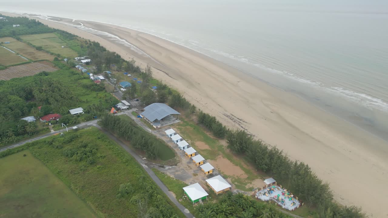 Beautiful Aerial Drone View Summer At Tanjung Kembang Water Park Beach Kabong , White Sandy Beaches, Coconut,And Palm Oil Plantation,Longe House,Homestay,Seratok,Sarawak,Borneo.