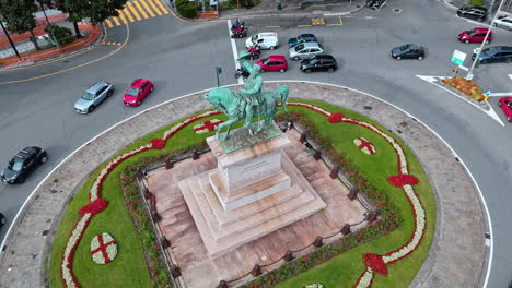 aerial view of piazza principe roundabout with equestrian statue in genoa, italy