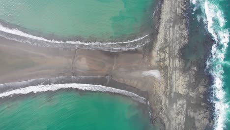 Triangular-tropical-rainforest-on-Whale-Tail-beach-strand,-Costa-Rica