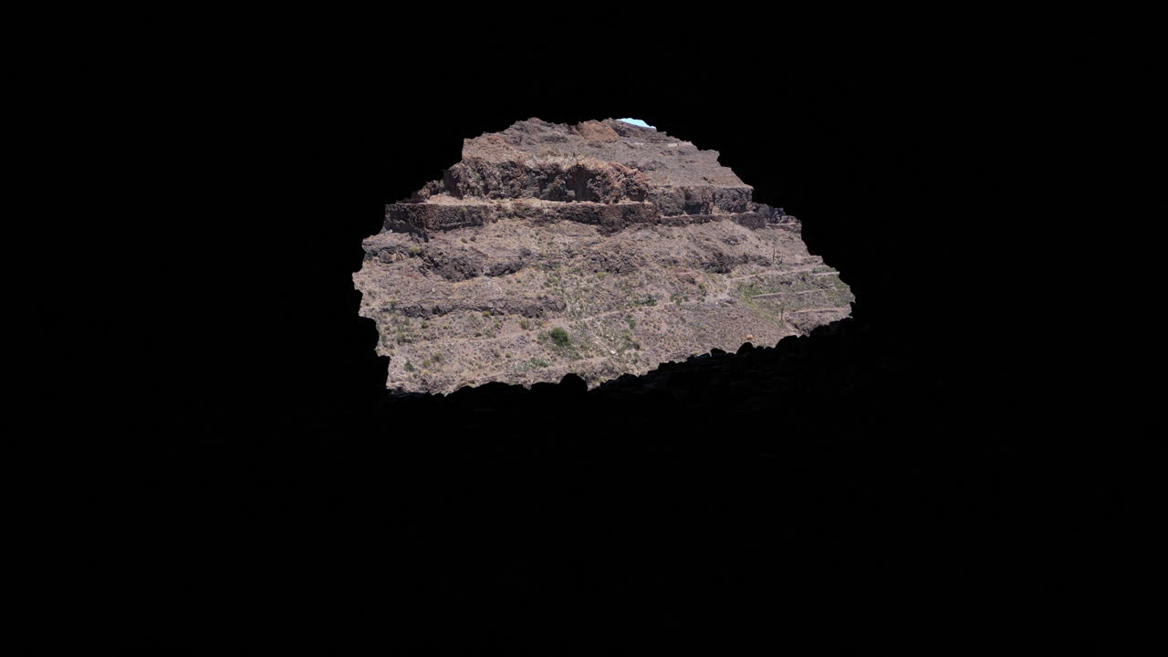 Exploring the Ansite Fortress Cave on the island of Gran Canaria, producing a magical effect.