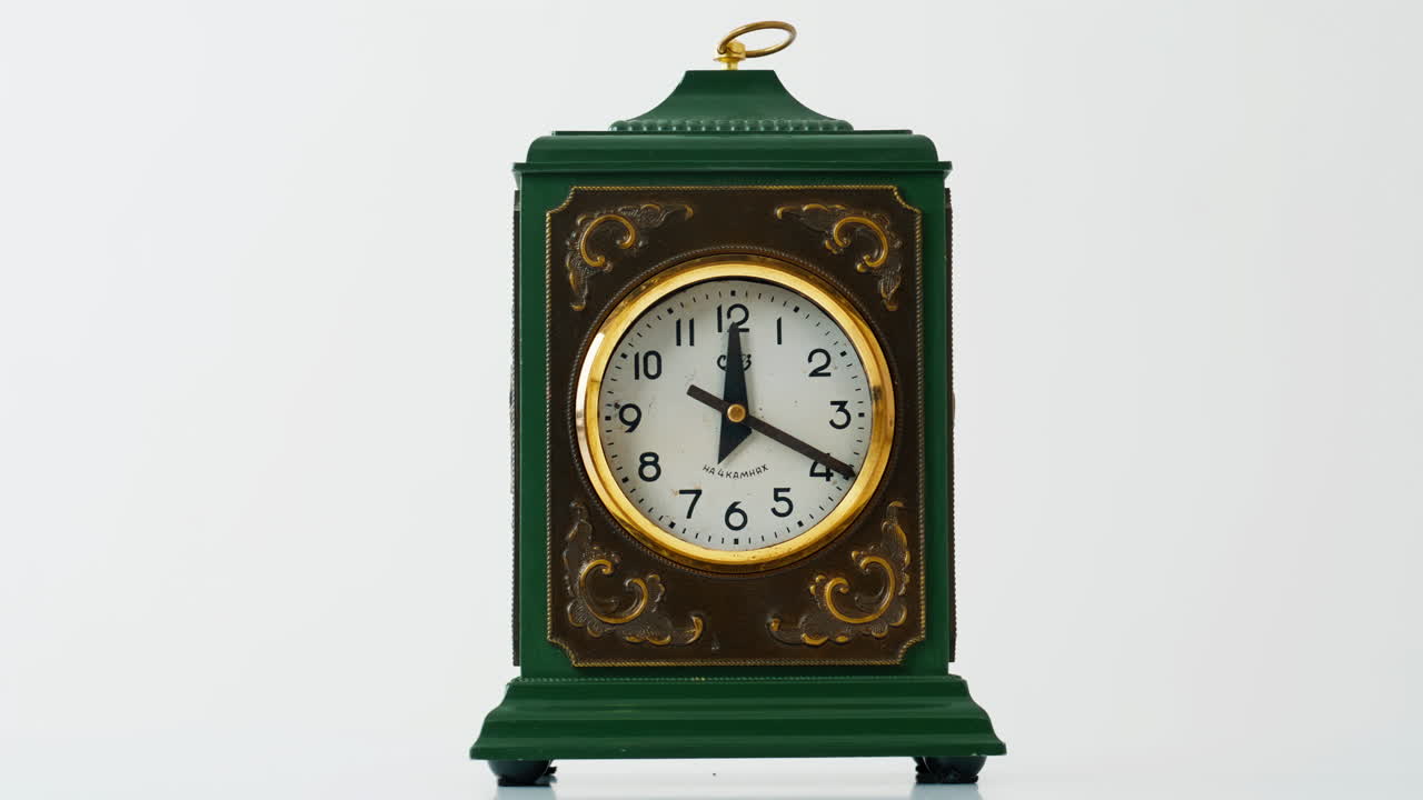 Exquisite clock showing time in circle dial closeup indoors. Elegant device