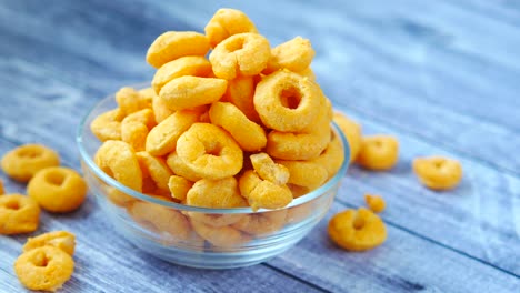 crispy cheese puffs in a glass bowl