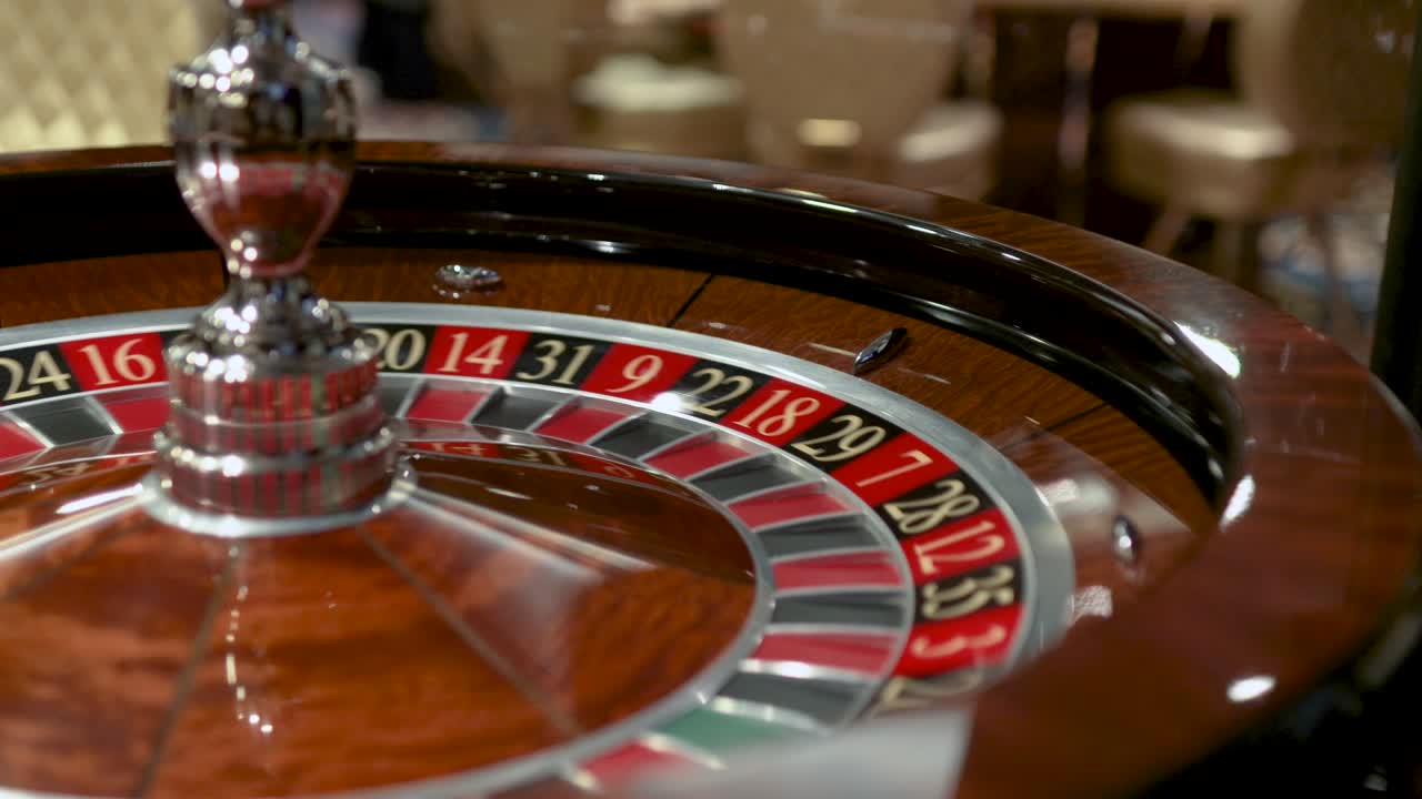 Roulette in the casino spins and white ball