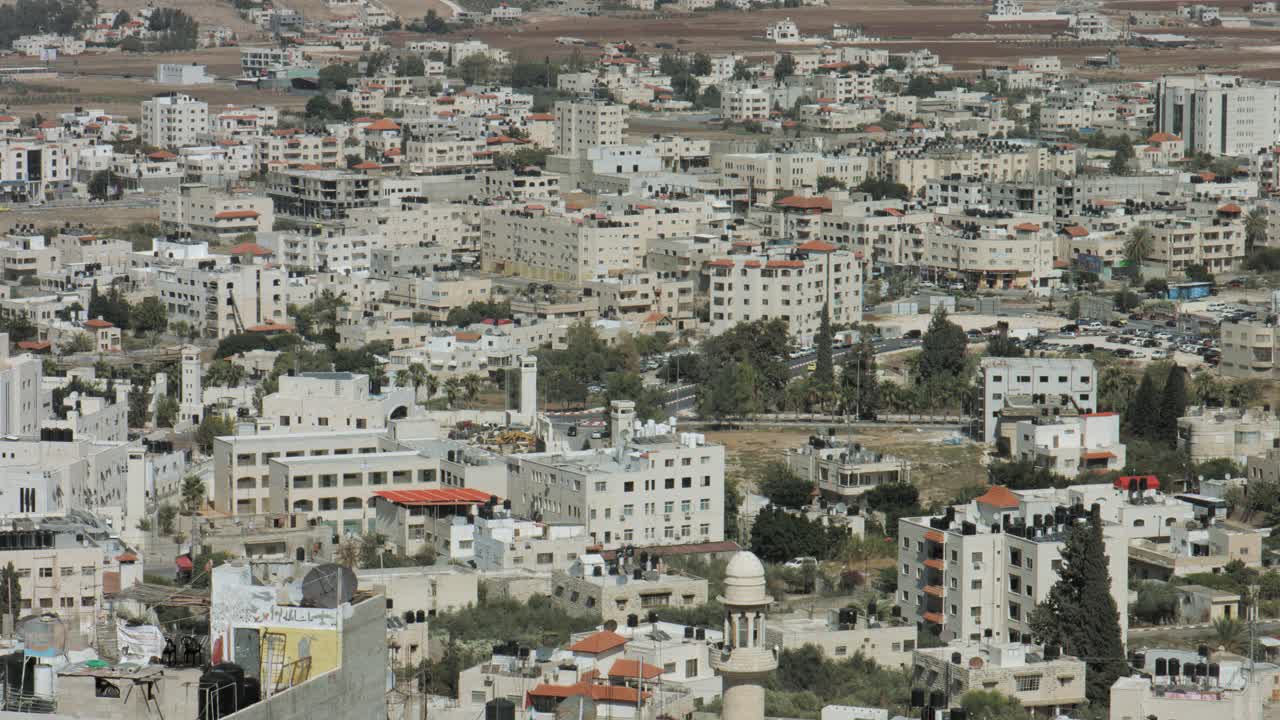 Jenin, Palestine, West Bank, Close view, Jenin houses and buildings, a Palestinian city in northern west bank. 4K footage