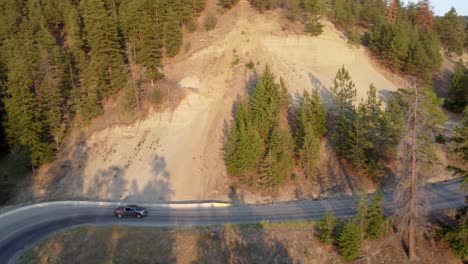 ford pickup on windy road overlooking okanagan lake | lakecountry, british columbia, canada | okanagan landscape | scenic view | wine vineyard | lakeside shoreline | summer time | south facing kelowna