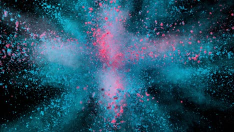 super slow motion of colored powder explosion isolated on dark background.