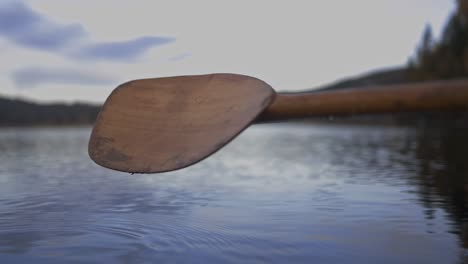 Drops-Of-Water-Falling-From-The-Paddle-Into-The-River