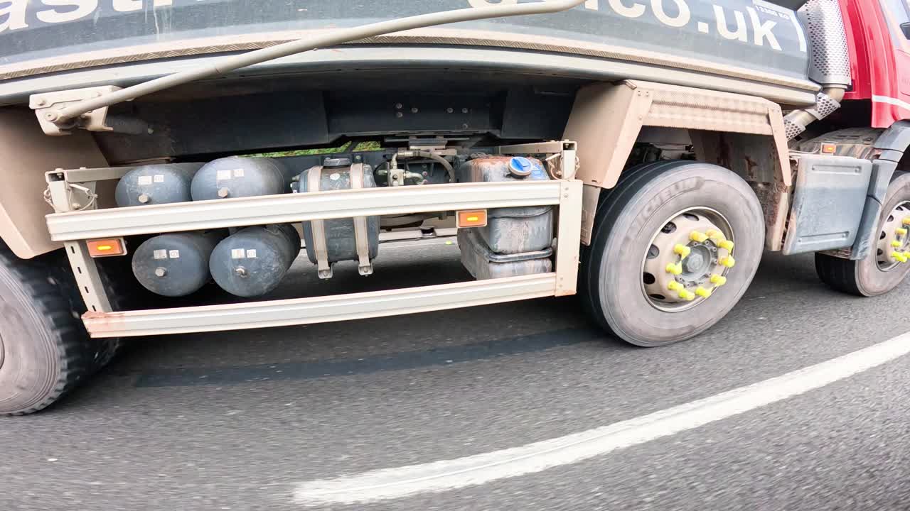A truck travels down a Birmingham street