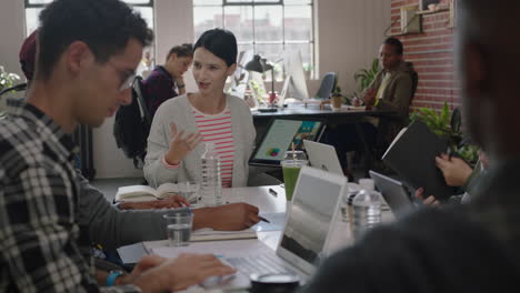 creative-team-meeting-brainstorming-marketing-manager-woman-showing-ideas-on-tablet-computer-screen-presenting-information-to-colleagues-discussing-strategy-in-office-presentation