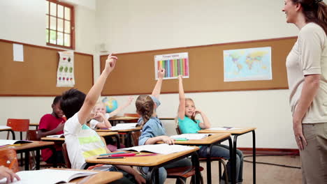 Cheerful-pupils-raising-their-fingers