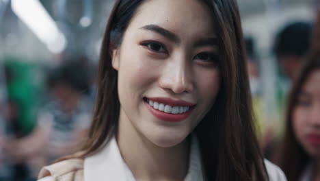 woman smiling on a train