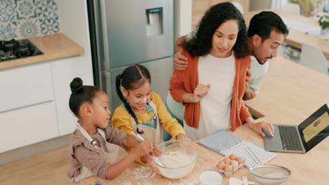 laptop, funny and a family baking in the kitchen