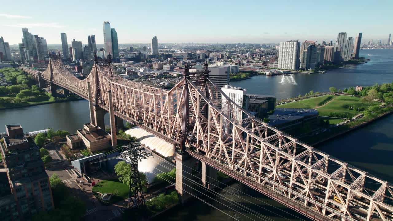 Crispy aerial of NYC's Queensboro Bridge, heading into Queens