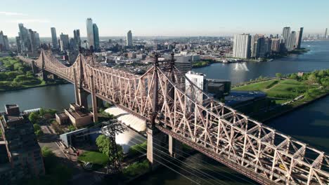 crispy aerial of nyc's queensboro bridge, heading into queens