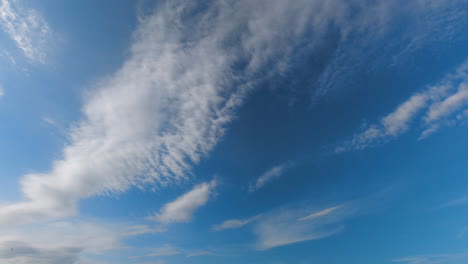 time lapse with cirrocumulus clouds in the sky at sunny day