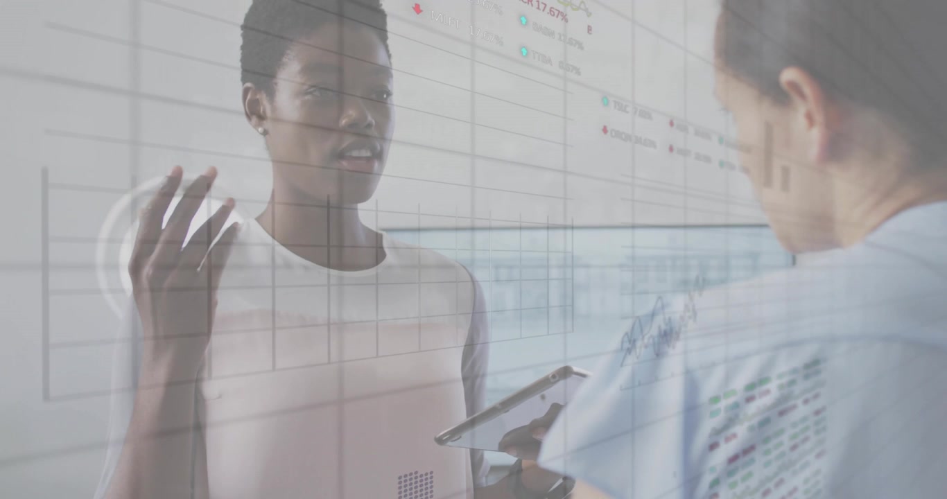 Animation of graphs processing data over diverse female colleagues talking at casual office