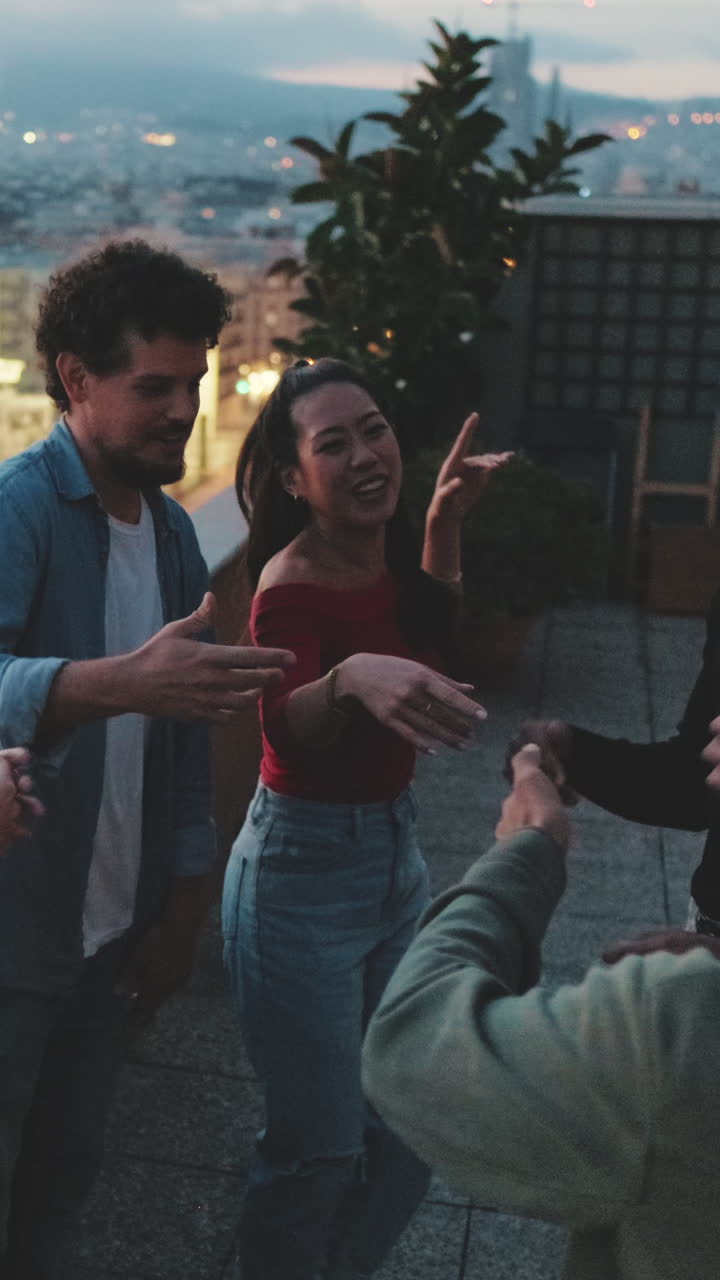 Group of friends having a good time at night