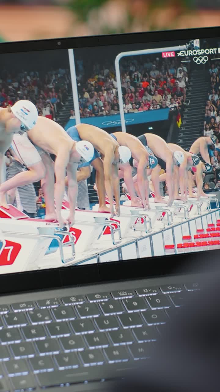 Vertical Video Bucharest, Romania - July 30th 2024 - Leader supporting the national swimmer