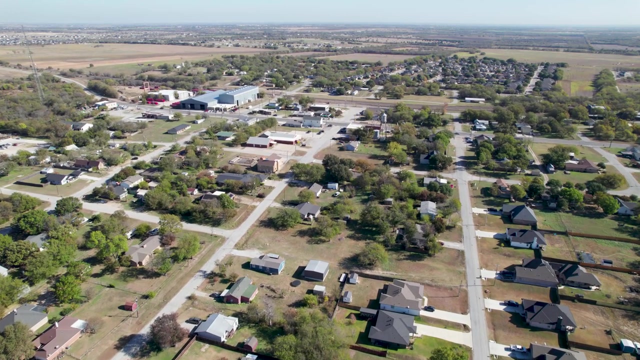 Aerial video of Rhome, Texas flying east near W. Morris St