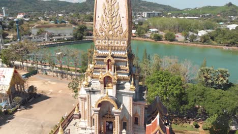 pagoda tower of wat chalong in mueang district, in phuket, thailand - aerial tracking orbit medium shot