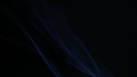 colors smoke in dark background