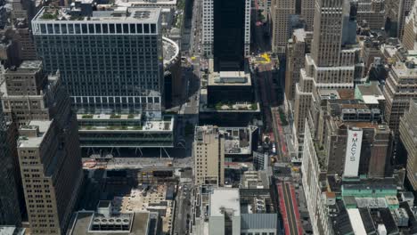 slow motion landscape of business district buildings high rise towers and skyscrapers infrastructure streets of manhattan brooklyn new york city usa america travel tourism