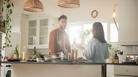 couple cooking together in a beautiful kitchen