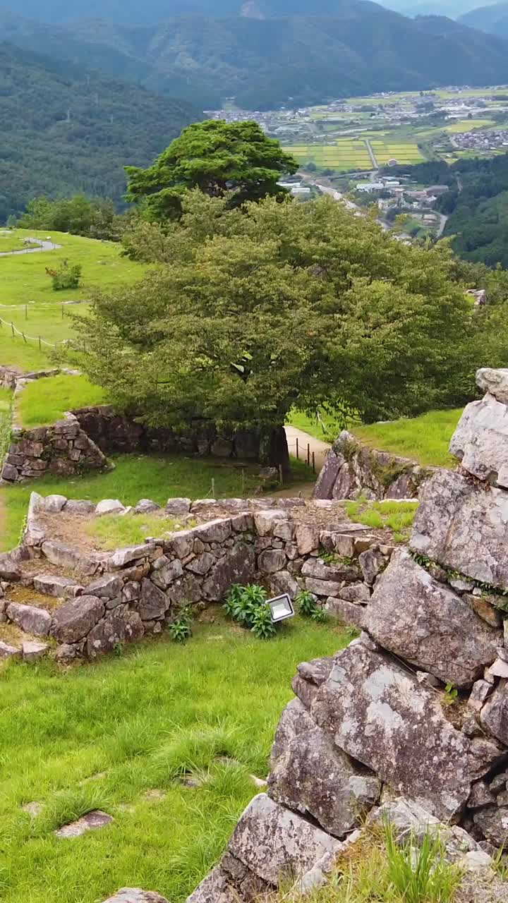Takeda Castie ruins, Aerial view of Japanese Green valley old fortress landscape