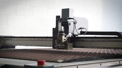 laser cutting machine in a manufacturing facility