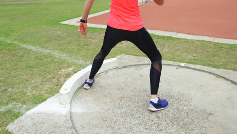 low section of female athlete practicing javelin throw at sports venue 4k