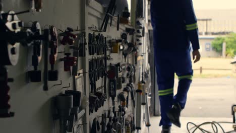 engineer closing the shutter of hangar 4k