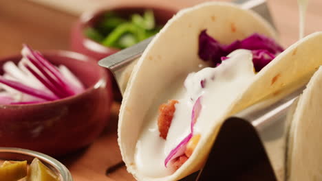 delicious homemade tacos with creamy sauce