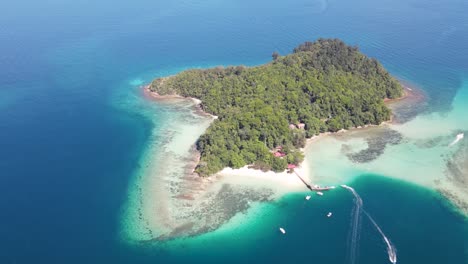 Aerial-Overhead-View-Of-Sapi-Island-On-Clear-Sunny-Day