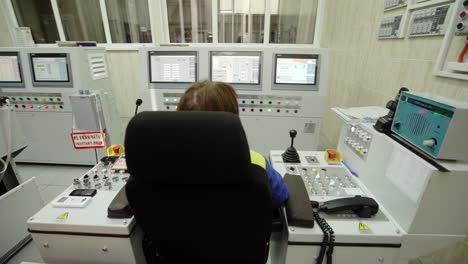 industrial control room with operators