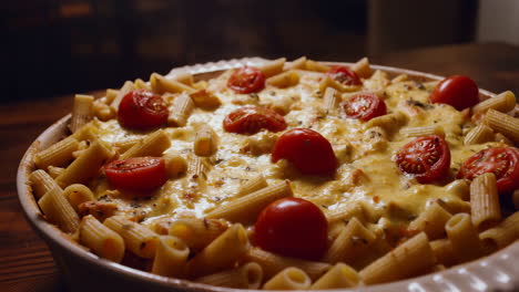 baked penne pasta with cheese and tomatoes