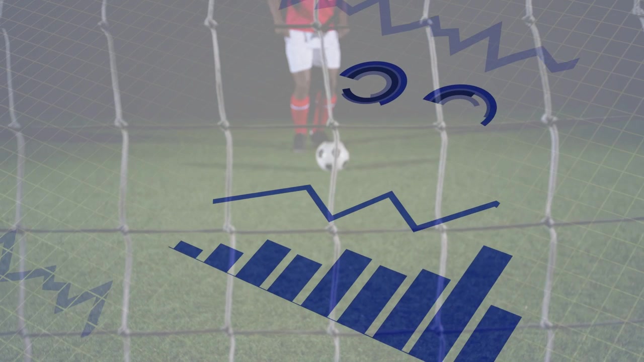 Red kicker stepping, striking ball to score; keeper diving to save, sports data animating over ball