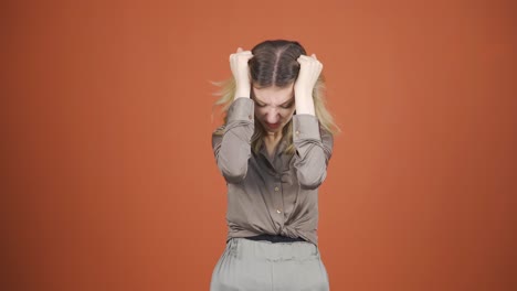 Young-woman-having-a-nervous-breakdown-in-front-of-the-camera.