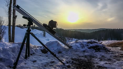 time lapse of a man making a time lapse with a inclined slider and camera