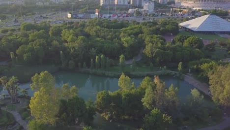 Green-trees-park-lake-stadium-city