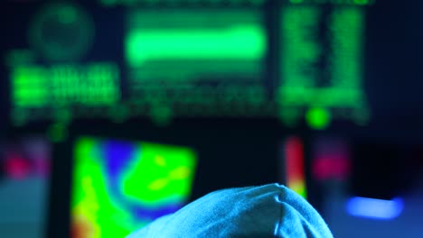 Out of focus screens of a russian hacker