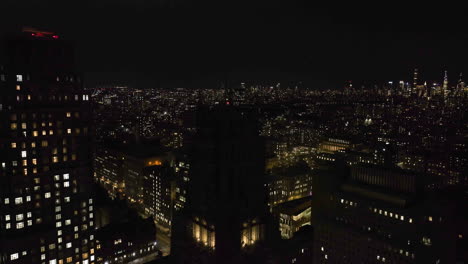 Aerial-view-away-from-the-Riverside-church-in-New-York,-USA---pull-back,-drone-shot