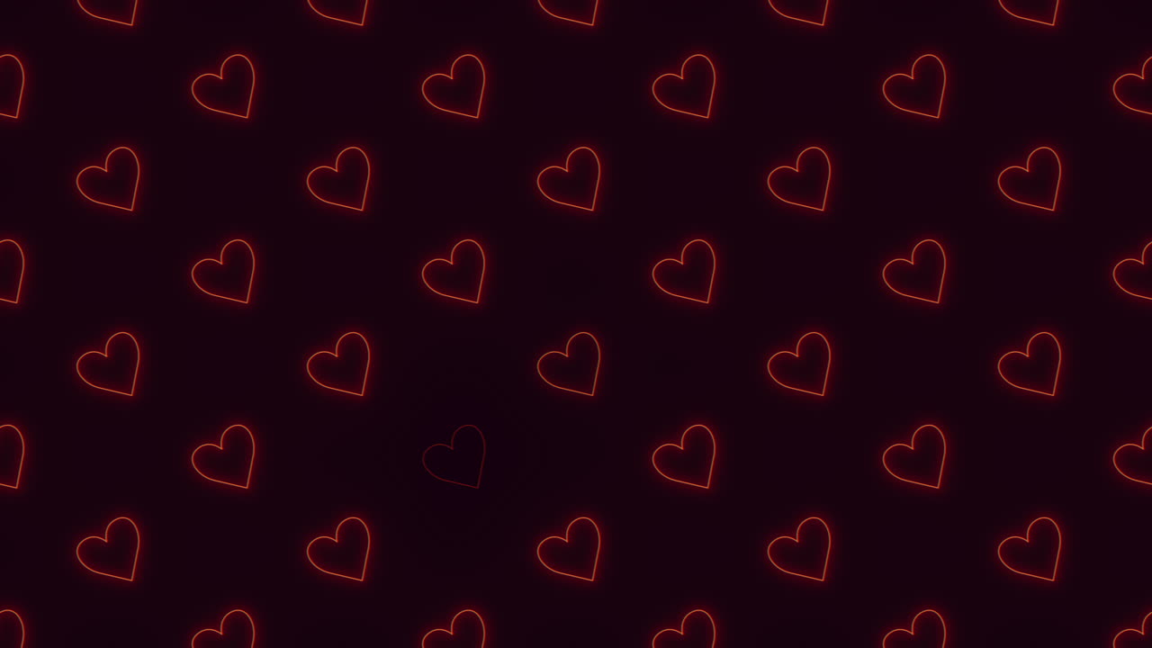 Glowing red heart pattern on black background floating love in the dark