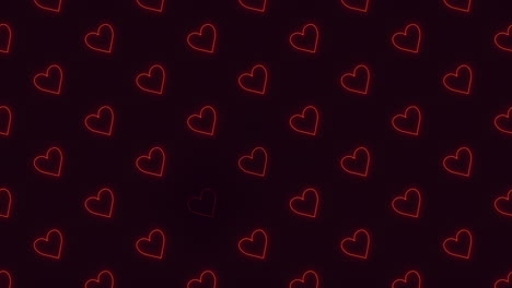 Glowing-red-heart-pattern-on-black-background-floating-love-in-the-dark