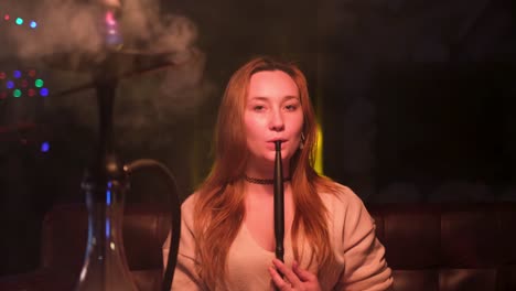 woman smoking hookah