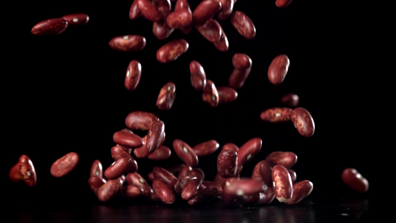 Red Kidney Beans Falling and Bouncing in Slow Motion