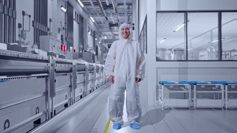 full body of asian male scientist smiling at pharmaceutical factory, vaccine production facility