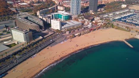 Beautiful-Aerial-Shot-of-Barceloneta-Beach-in-Barcelona,-Spain