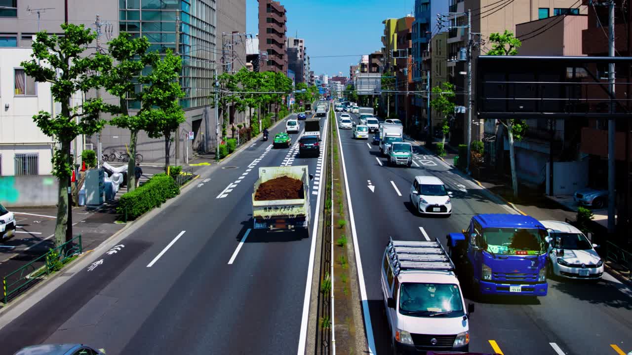 도쿄의 도시 거리에서 교통 체증의 타임 스 긴