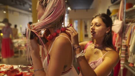 two women shopping for clothes