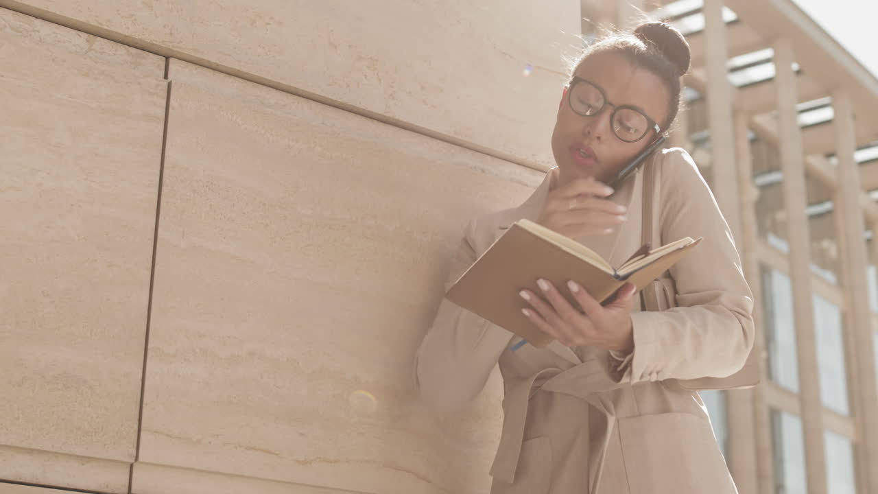 Businesswoman Making Phone Call Outdoors
